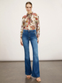 Flared jeans with button feature image number 3