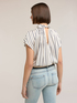 Blusa over a righe con fiocco posteriore image number 1