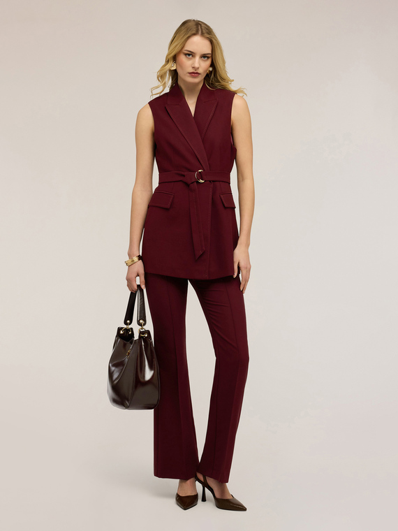 Double-breasted belted vest