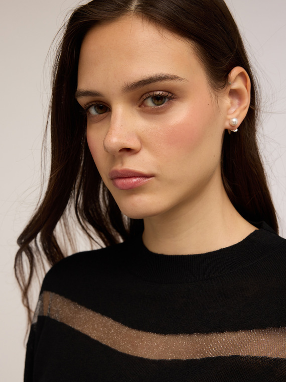 Sweater with transparent insert