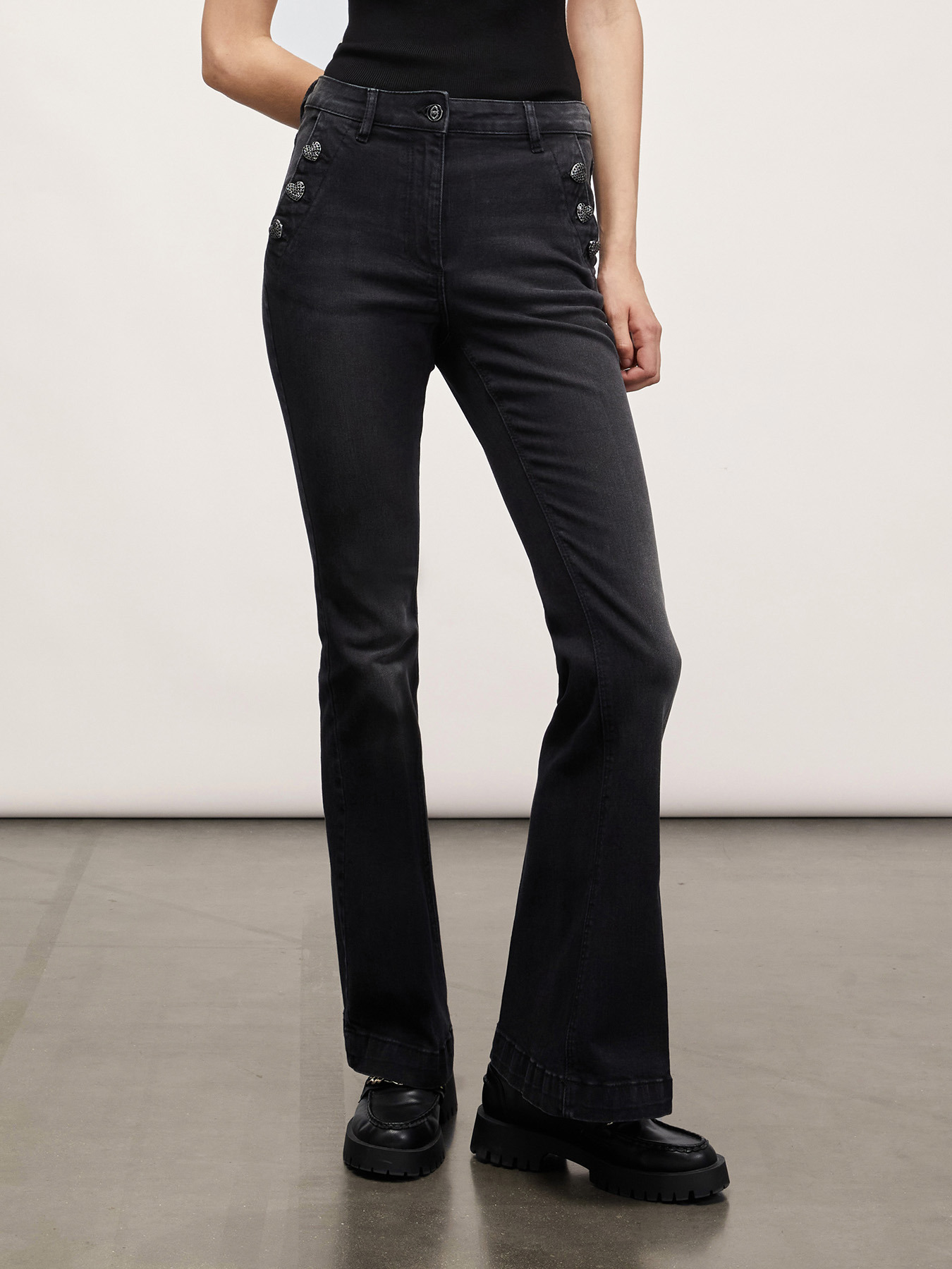 Flared jeans with button feature image number 0