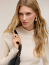 Diagonal ribbed sweater with asymmetric hem image number 3