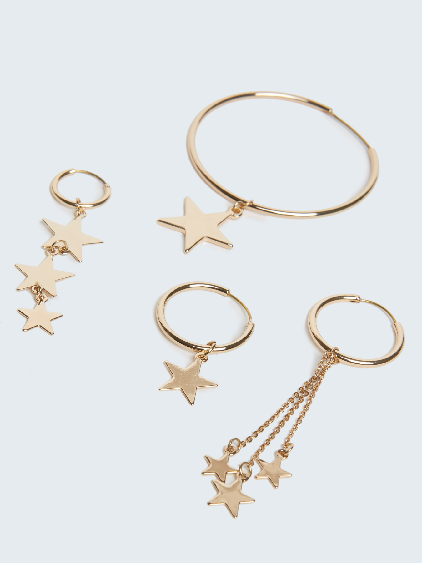 Set of hoop earrings with star image number 0