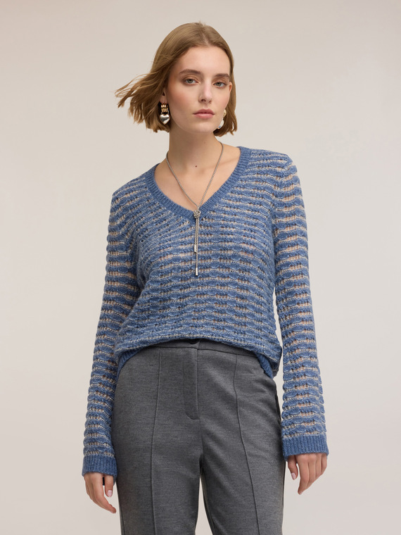 Perforated sweater with flare sleeves
