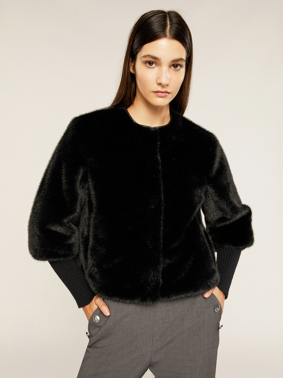 Short faux fur cape with knit cuffs