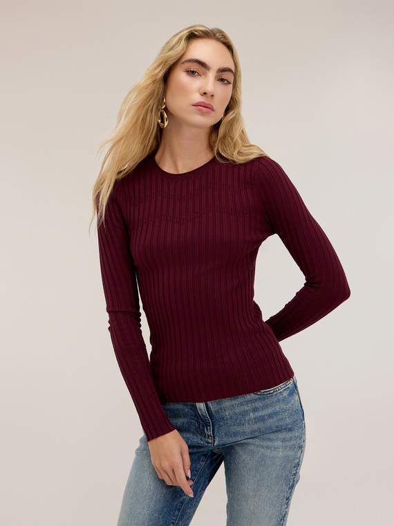 Flat rib knit sweater with flared cuff