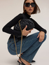 Quilted clutch with chain shoulder strap image number 0