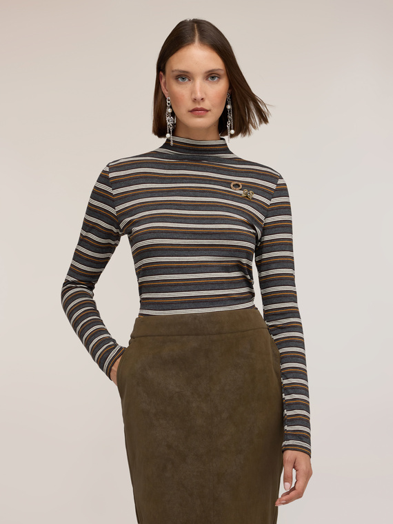 Striped polo neck with brooch decorations