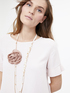 Collana con fiore in tessuto e perle image number 1