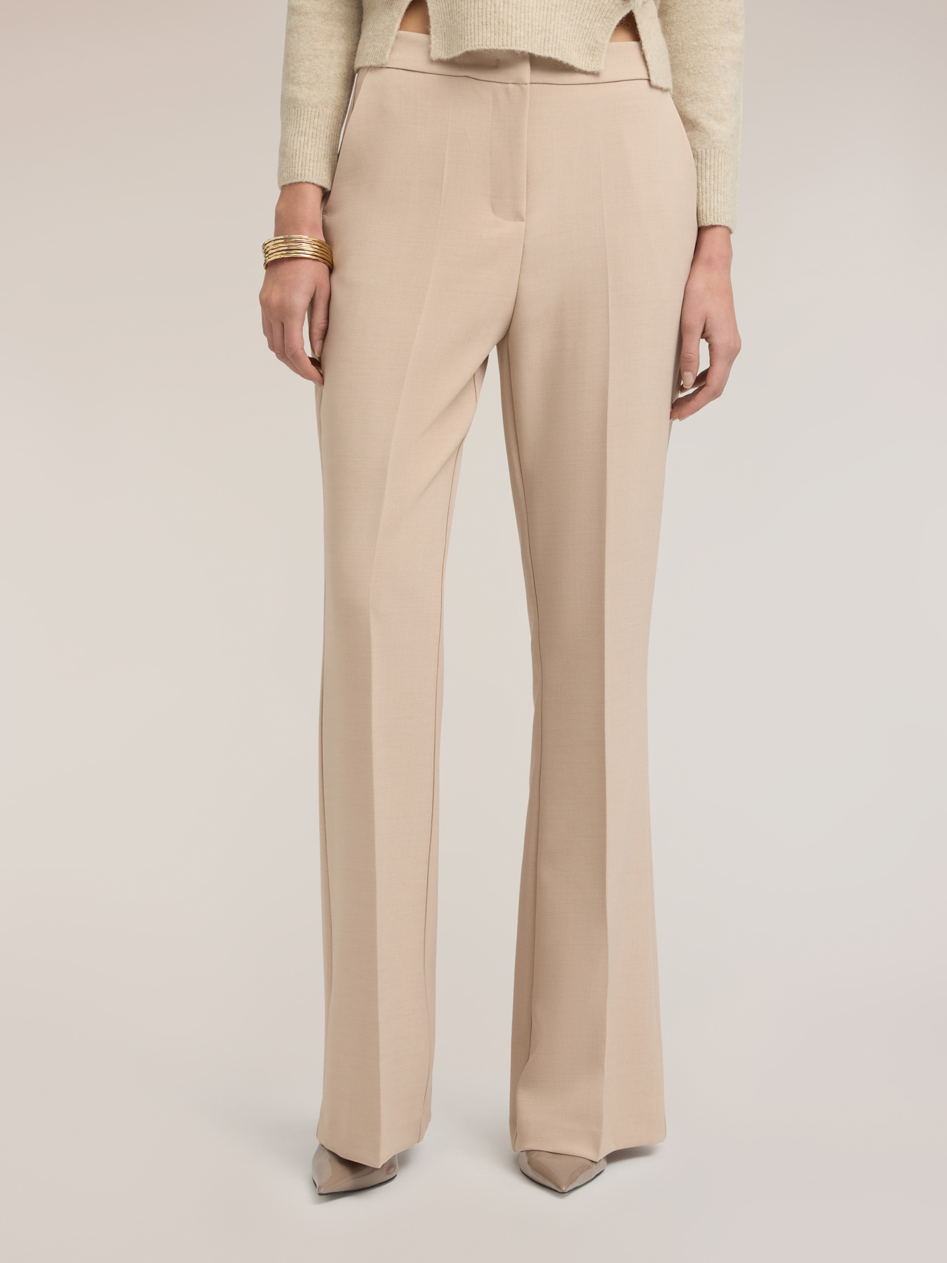 Flare pants with pressed crease image number 2