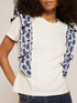 T-shirt con rouches fantasia geometrica image number 2
