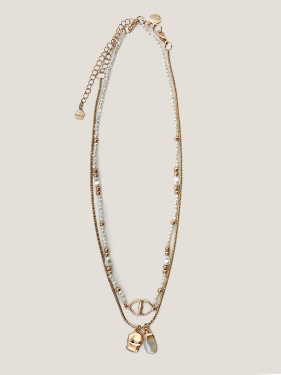 Long multi-strand necklace with beads