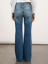 Jeans mit weitem Bein und aufgestickten Schmucksteinen image number 1