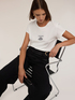 T-shirt con scritta e applicazioni in strass image number 3