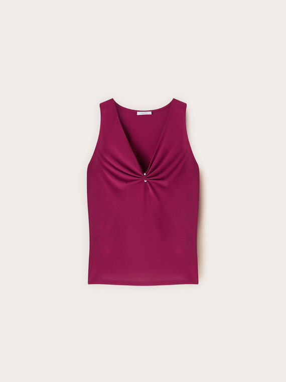 Top avec d&eacute;collet&eacute; en V drap&eacute; et piercing