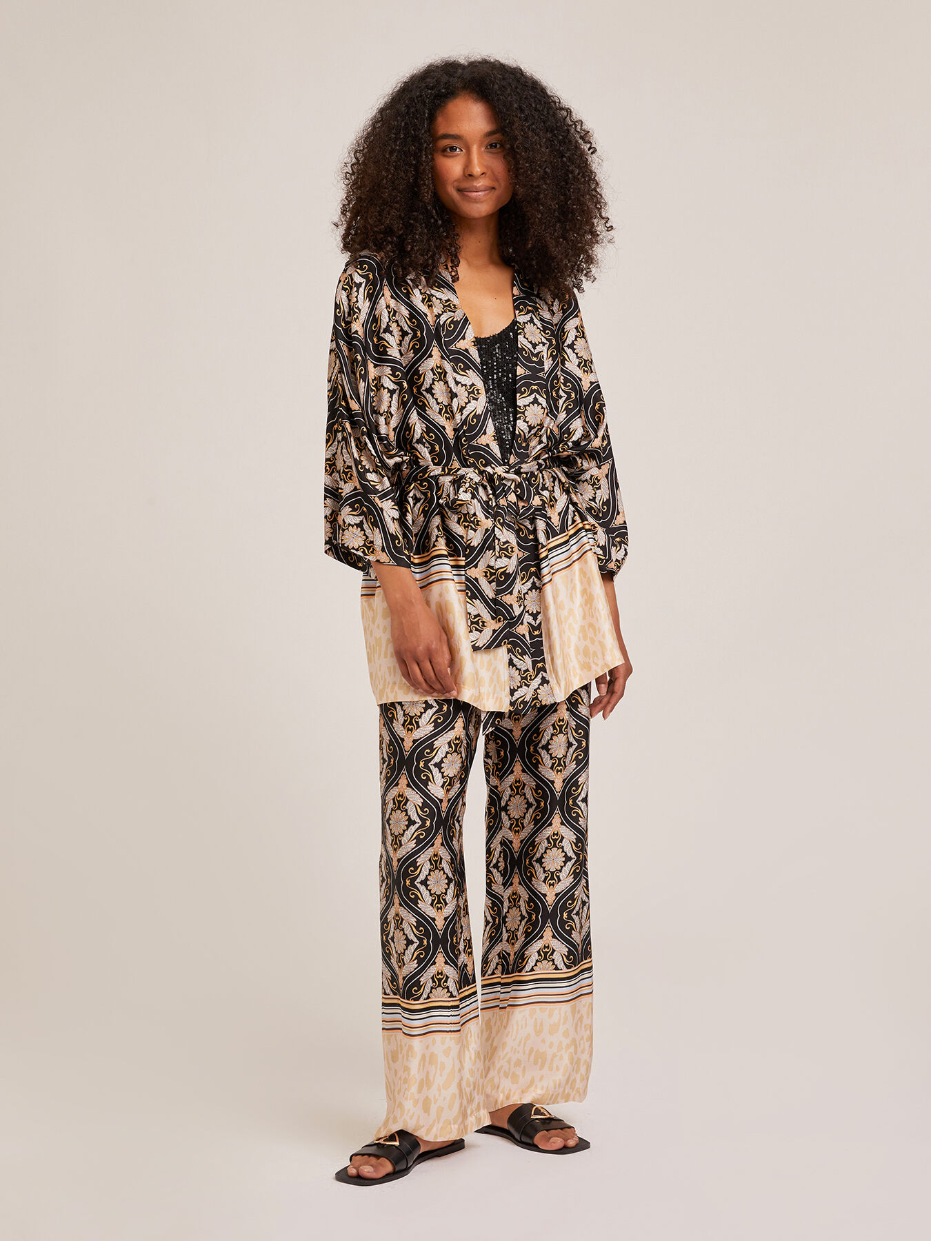 Ethnic pattern wide-leg trousers with sash image number 0