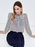 Blusa con estampado de cadenas image number 0