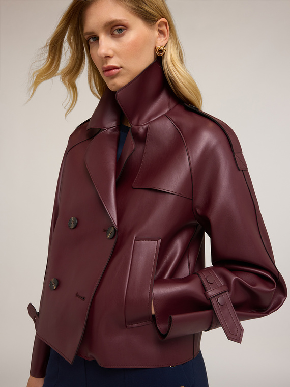 Short double-breasted trench coat in coated fabric