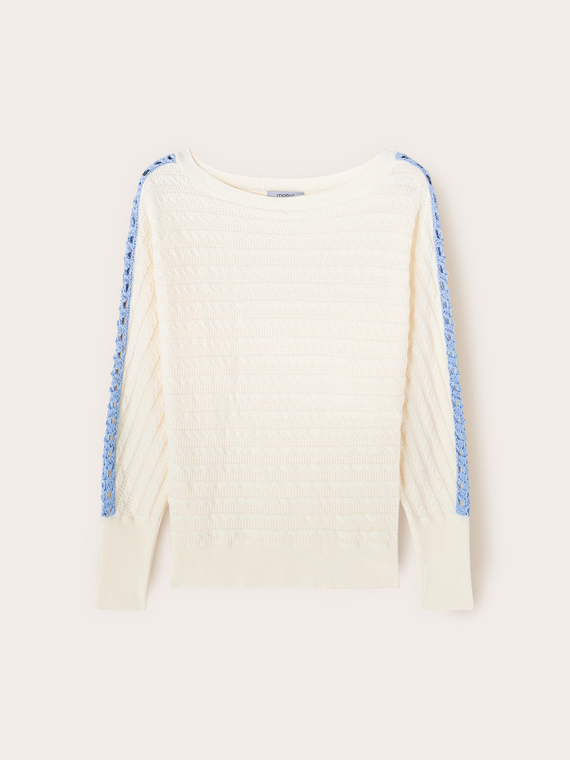 Oversized sweater with openwork inserts on the sleeves