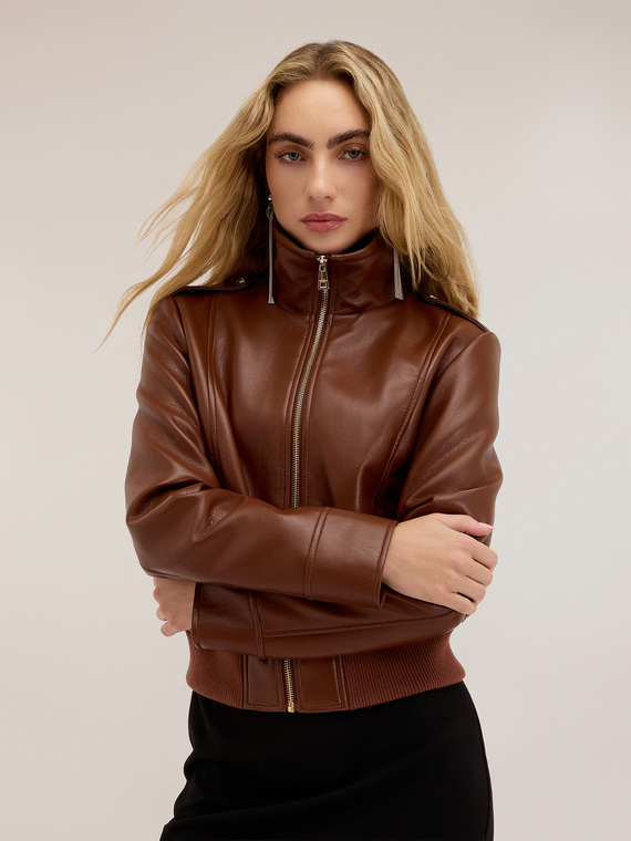 Short jacket with high collar and zip
