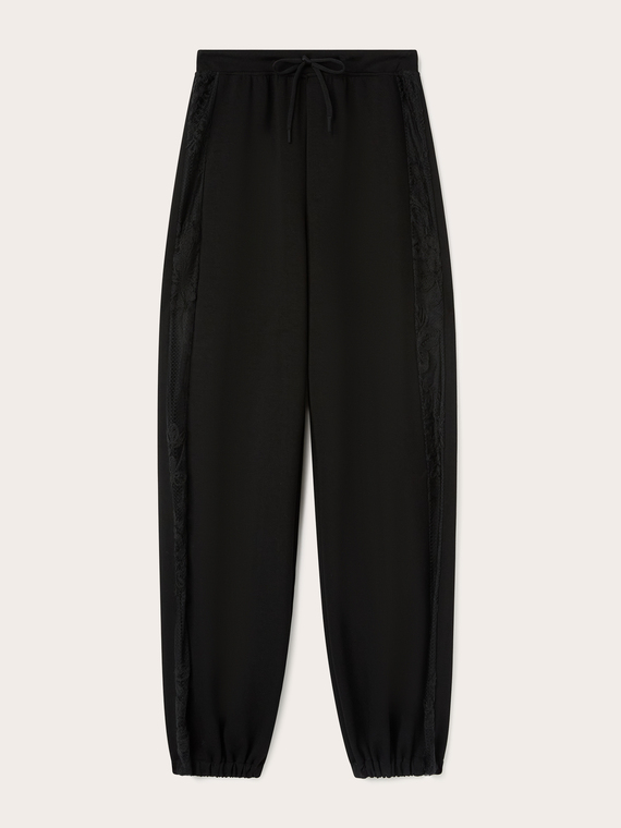 Jogging pants with lace inserts