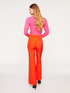 Flared solid colour trousers image number 1