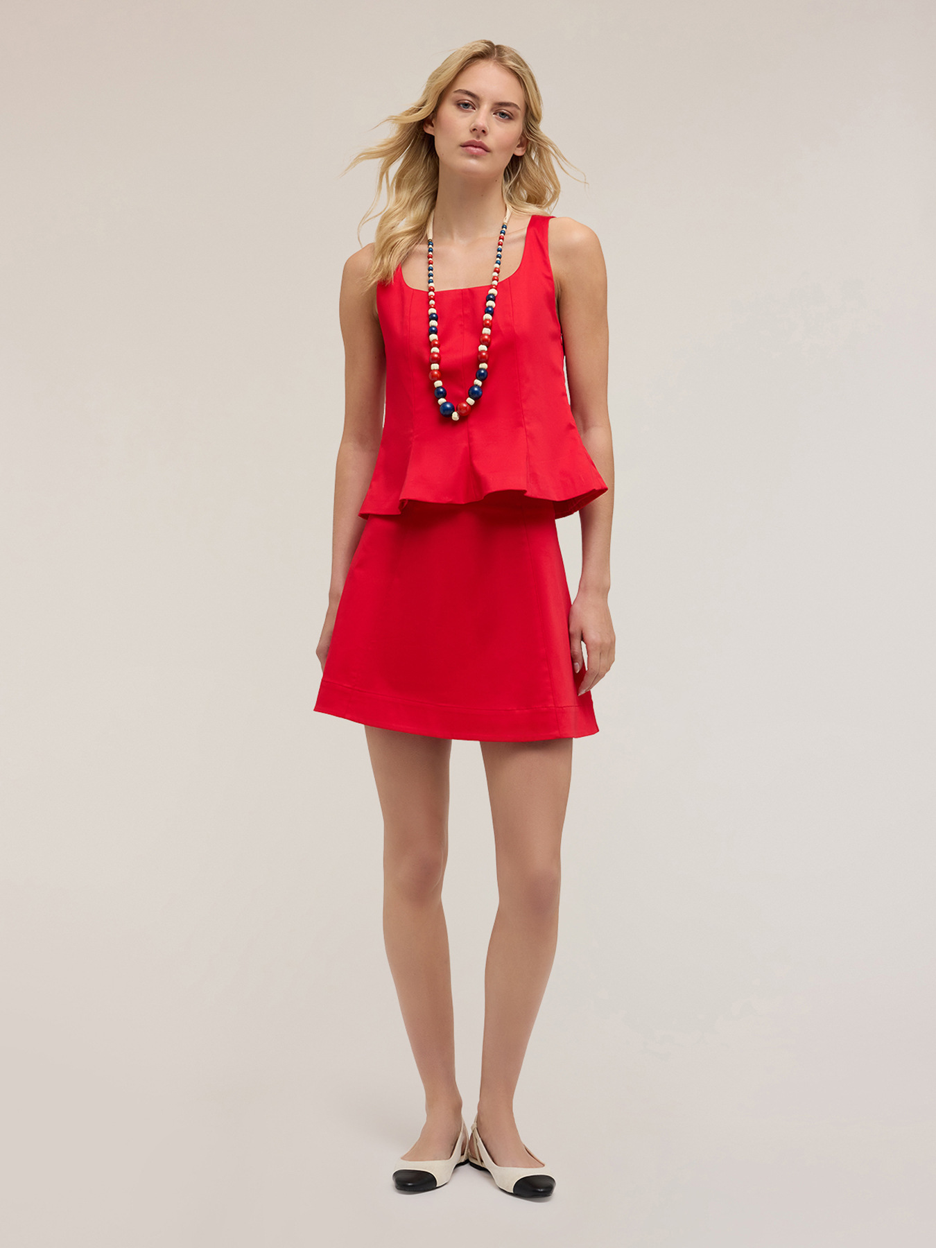Cotton peplum top image number 0