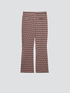 Geometric patterned flared trousers image number 3