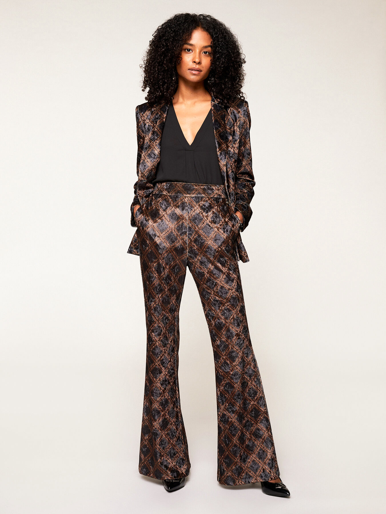 Geometric patterned chenille flared trousers image number 0