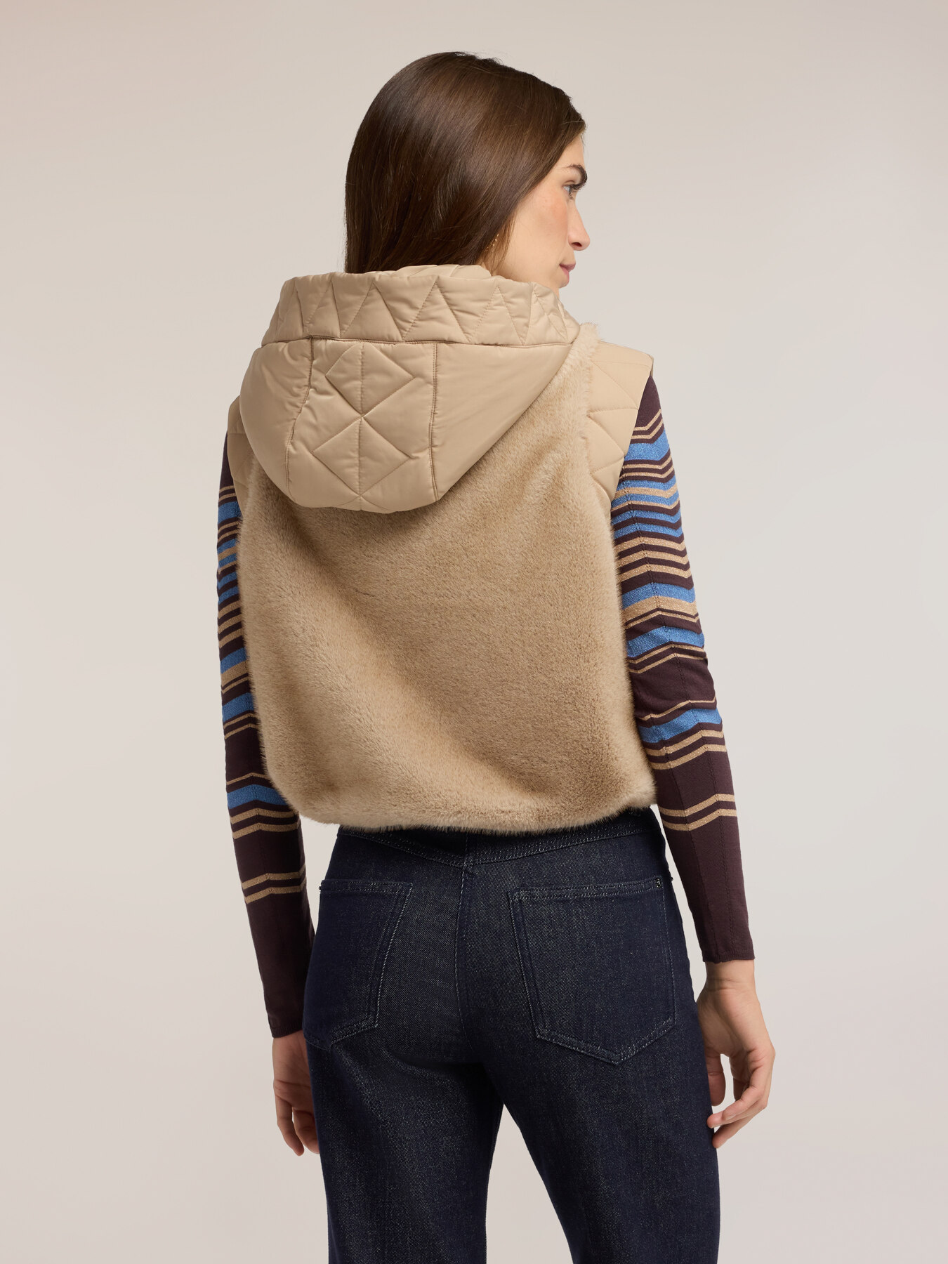 Hooded vest with quilted inserts image number 1