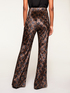 Geometric patterned chenille flared trousers image number 1