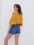 Off shoulders blouse with tassels image number 1