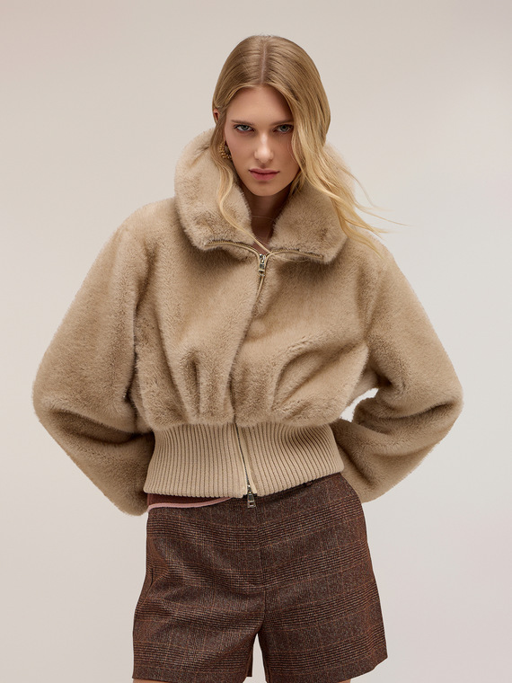 Bomber jacket with high collar in fuzzy texture