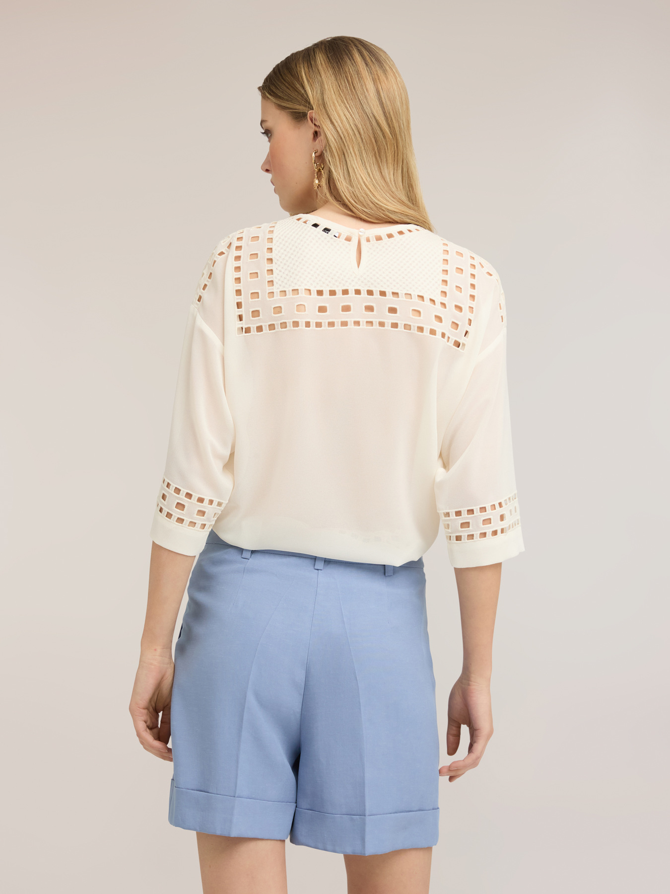 Blusa in georgette con ricami ajour&eacute; image number 1