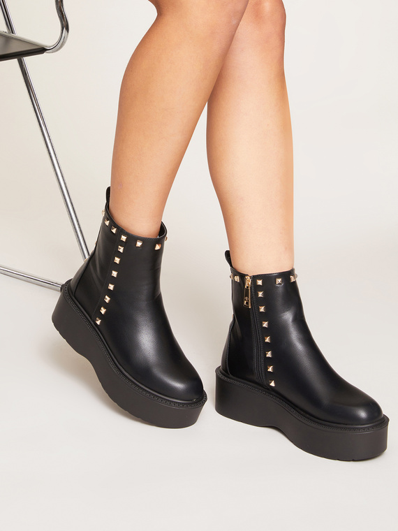 Combat boots with studs