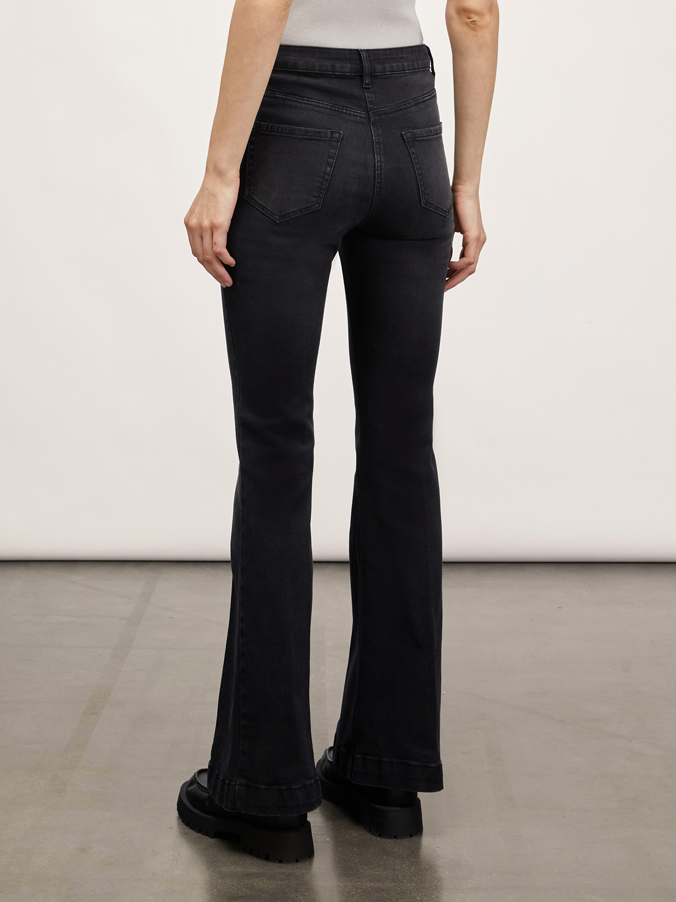 Flared jeans with button feature image number 1