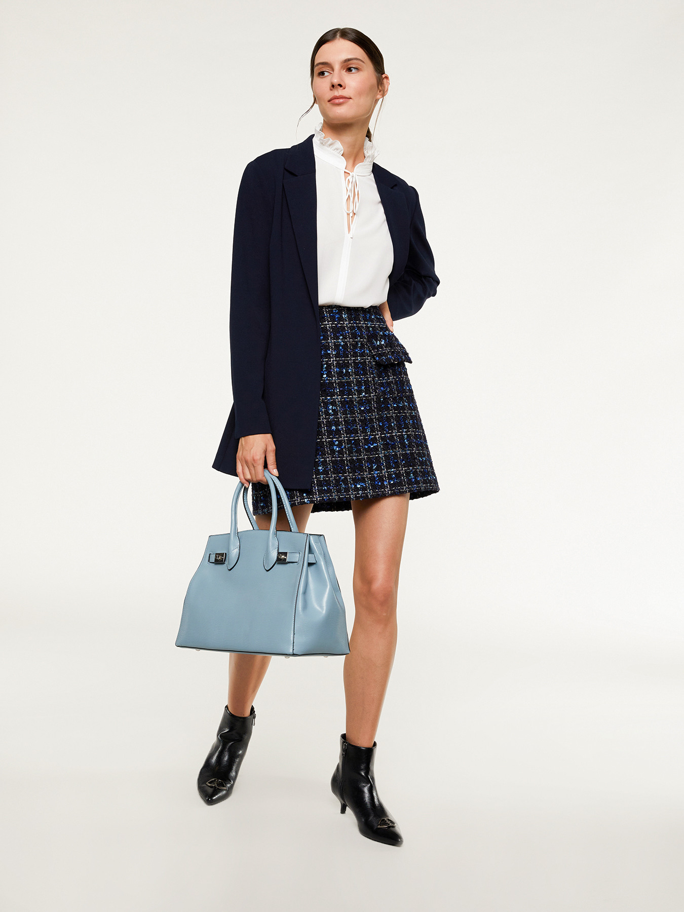 Short tweed skirt with chequered pattern image number 0