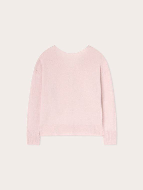 Wool sweater with back buttoning