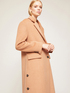 Men&rsquo;s long coat with button detail image number 2