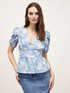 Foliage patterned peplum cut top image number 0
