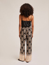 Ethnic pattern wide-leg trousers with sash image number 1
