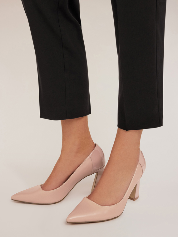 Court shoes with spool heel
