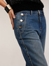 Jeans with button feature and metal chain image number 3