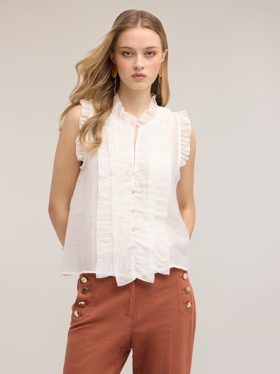 Muslin blouse with ruffles