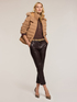 Pantalones slim fit en tejido revestido image number 0