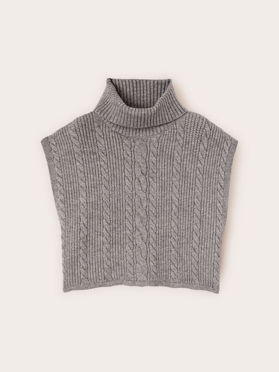 Knitted shoulder cover with cable knit pattern