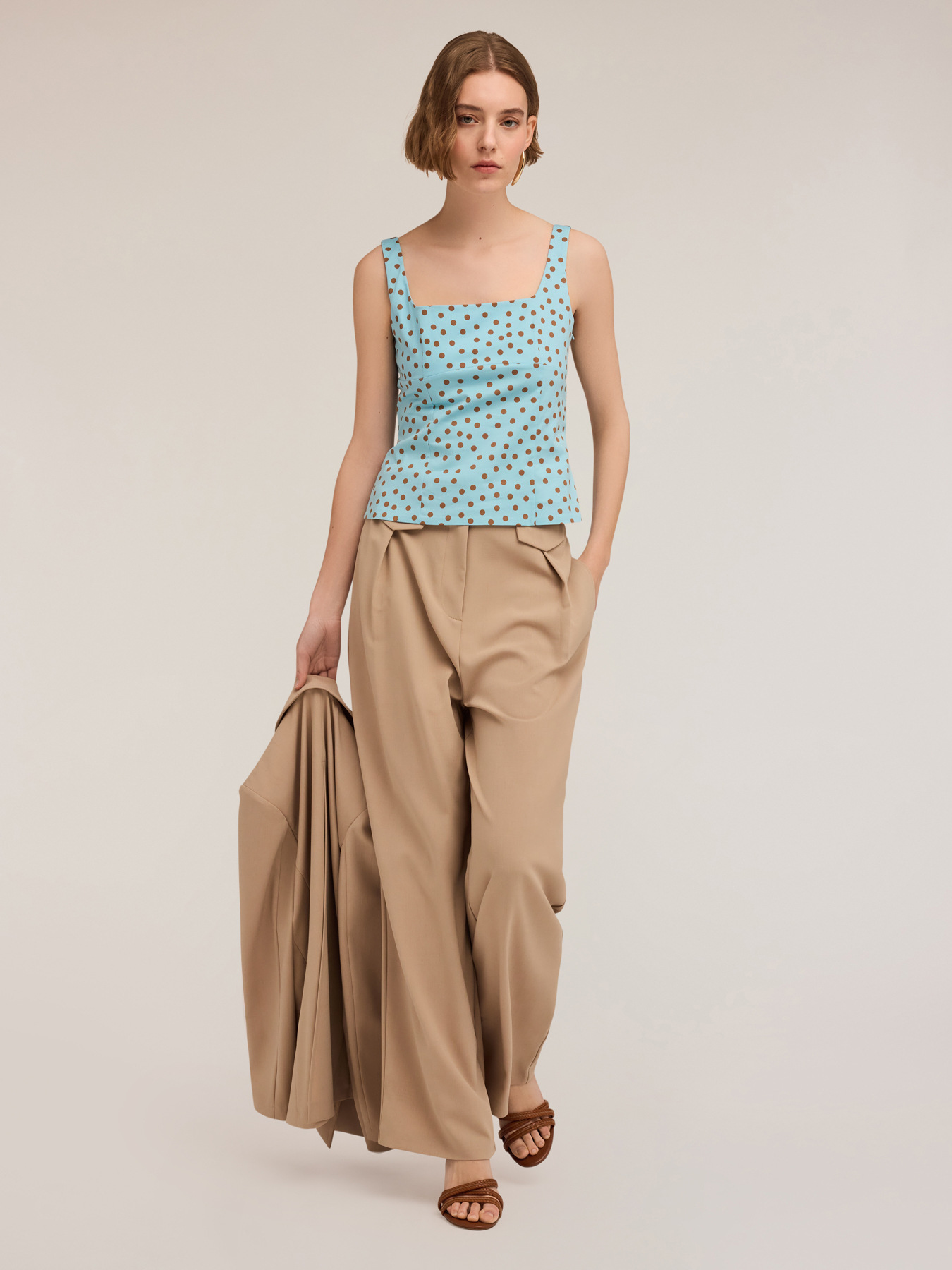 Top bustier con cut-out posteriore a pois image number 0