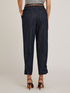 Trousers with denim effect strap on the hem image number 1