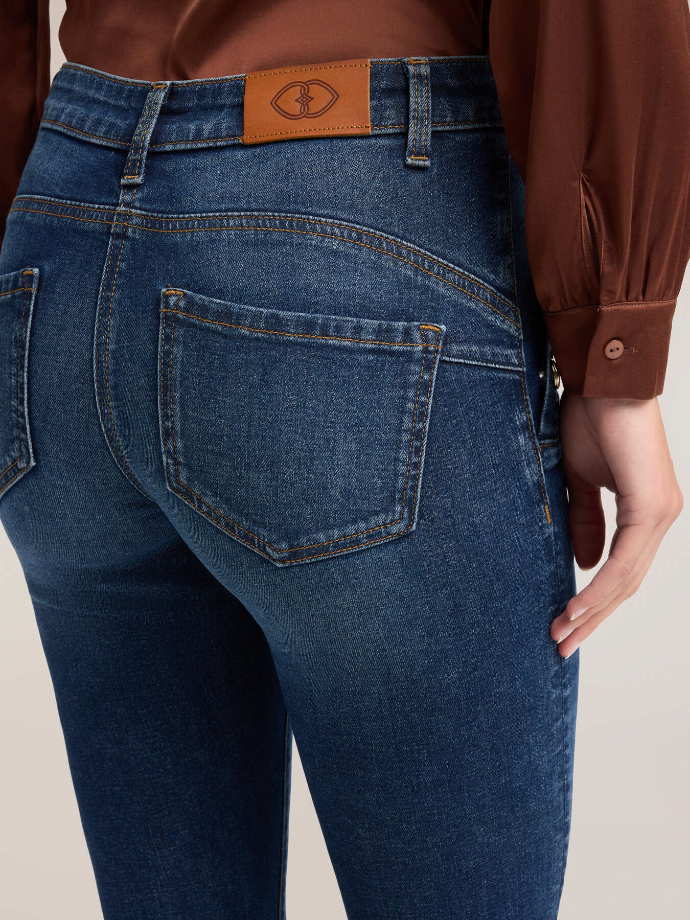 Flare jeans with metal buttons image number 3