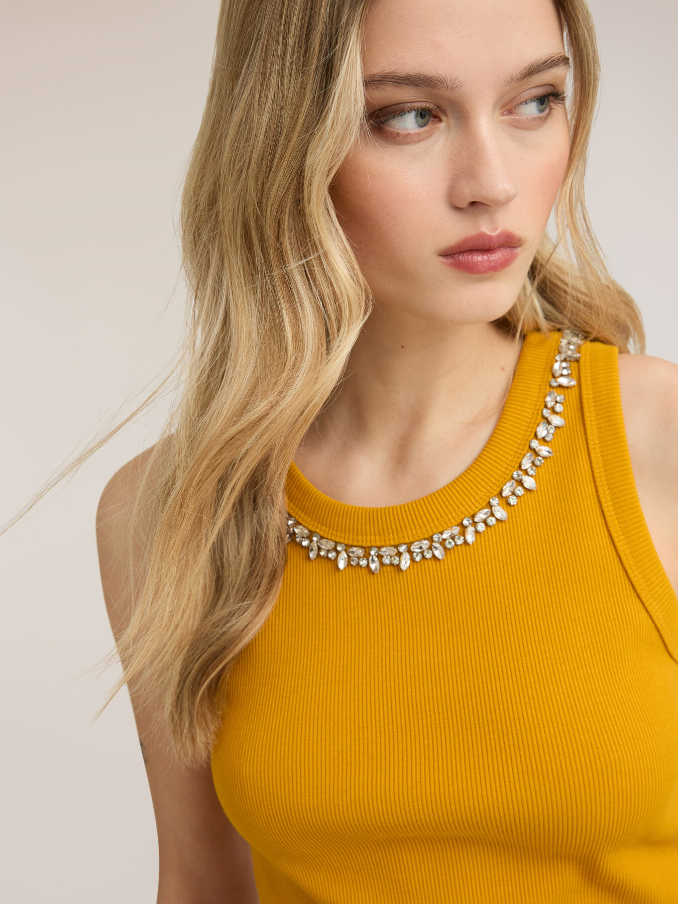 Top with rhinestones on the neckline image number 3